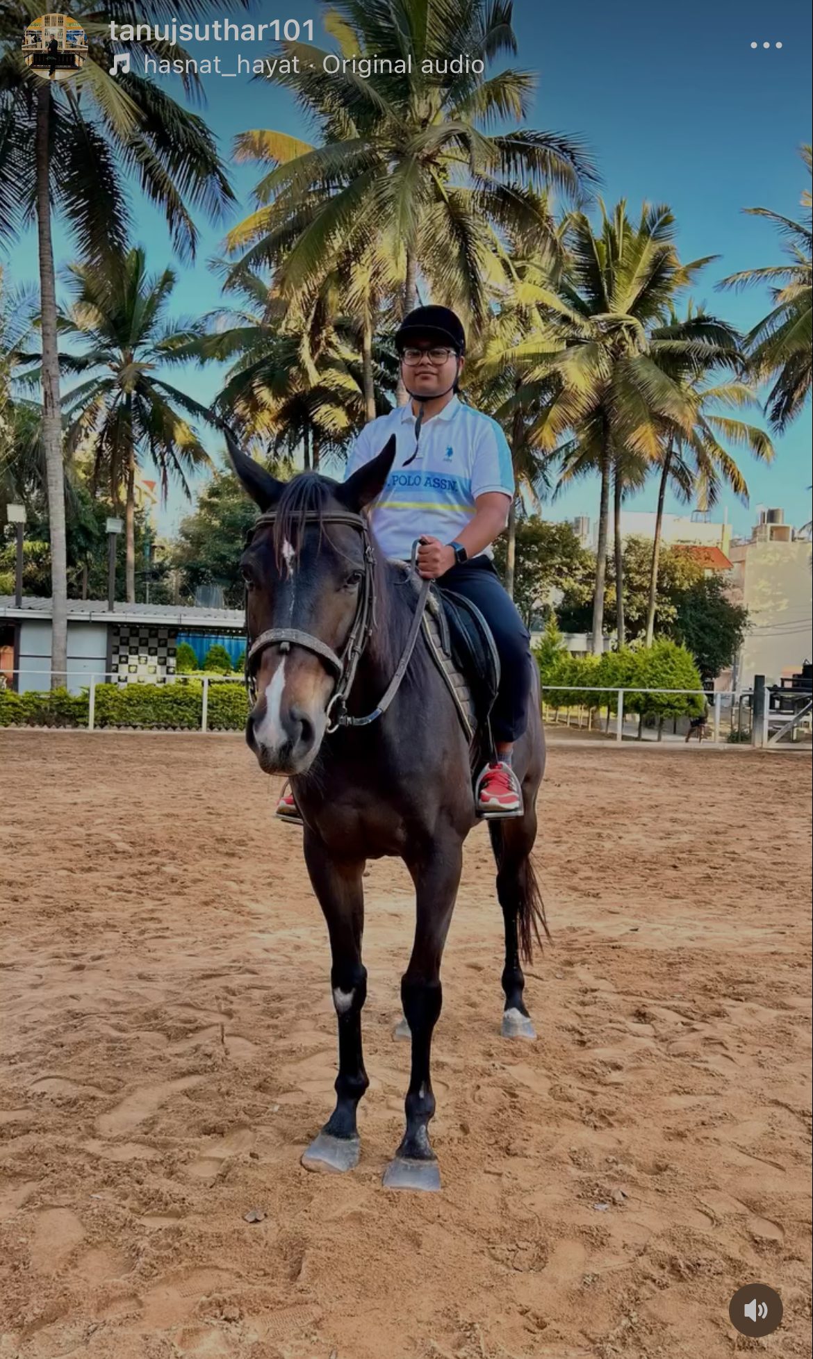 Tanuj riding a horse at dusk