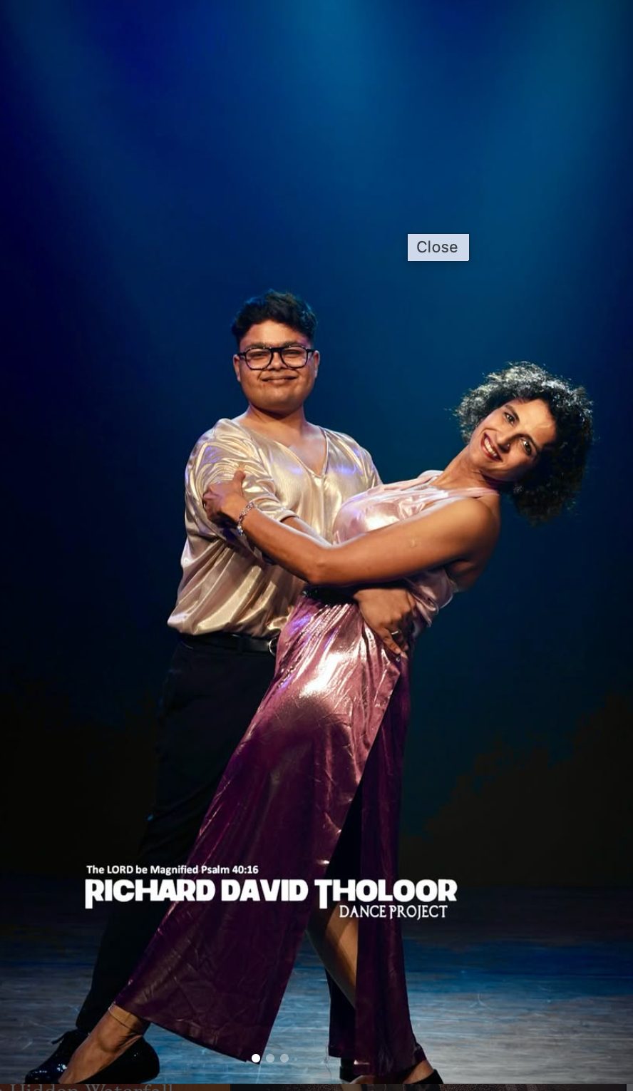 Tanuj performing on stage in a dance project